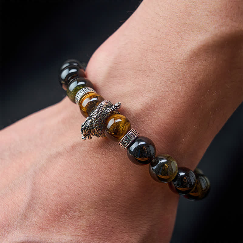 Silver Sheen Obsidian Red Tiger Eye Dragon Success Bracelet - on wrist gray background dragon charm detail, elegant