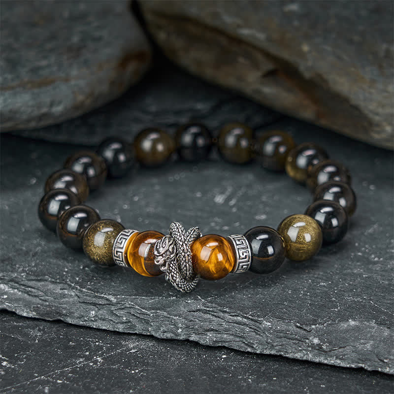 Silver Sheen Obsidian Red Tiger Eye Dragon Success Bracelet - overhead flat lay dark slate wing charm focal point, guardian