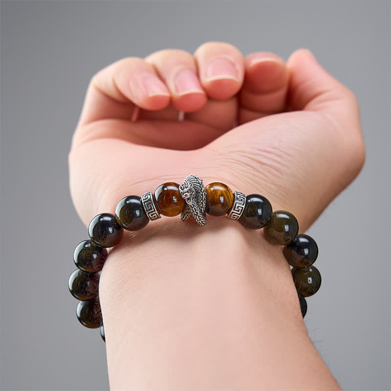 Silver Sheen Obsidian Red Tiger Eye Dragon Success Bracelet - curved on dark stone dragon head between red beads, earthy