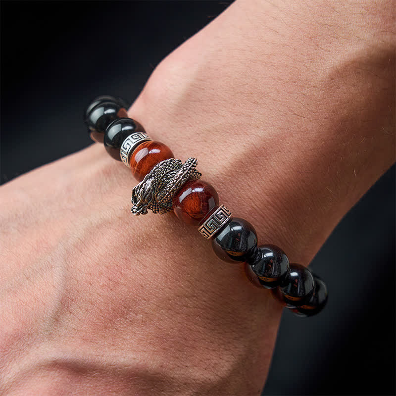 Silver Sheen Obsidian Red Tiger Eye Dragon Success Bracelet - overhead dark slate coiled dragon with tiger eye, striking