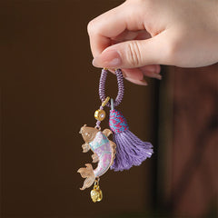 Koi Fish Prosperity Keychain - purple koi charm with iridescent body, gold lotus and tassel