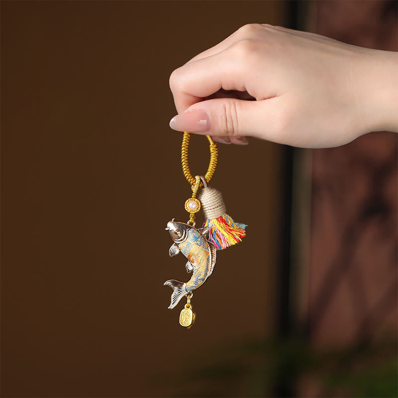 Koi Fish Prosperity Keychain - enamel koi charm with gold accents, rainbow tassel, brass ring