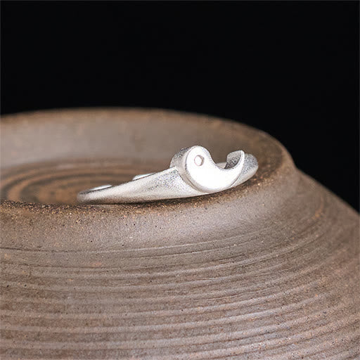 Yin Yang Copper Ring - Silver wave-design ring on ceramic pottery, matte nature-inspired ring