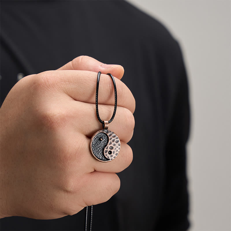 Vintage Yin Yang Necklace - hand-held copper pendant showing texture, unisex spiritual gift