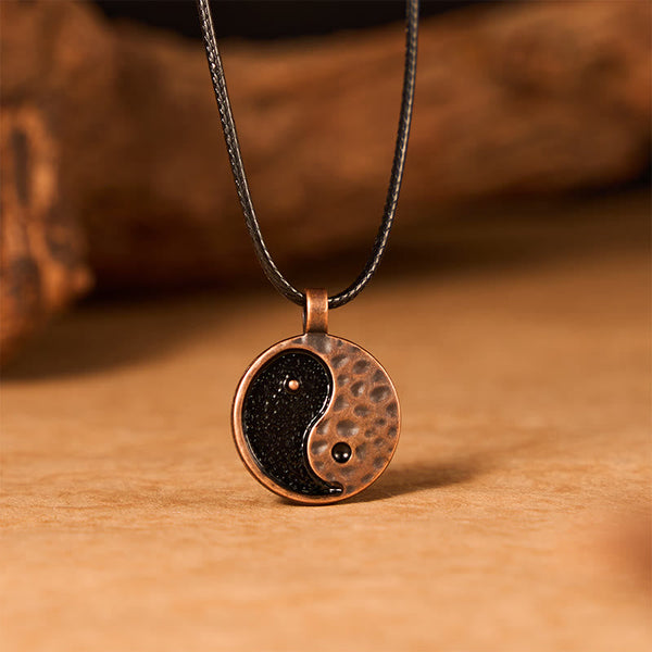 Vintage Yin Yang Necklace - textured copper and dark metal pendant on leather cord, artisan jewelry