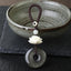 Rainbow Obsidian Lotus Peace Buckle Keychain - full pendant with golden sheen disc on braided cord, healing amulet