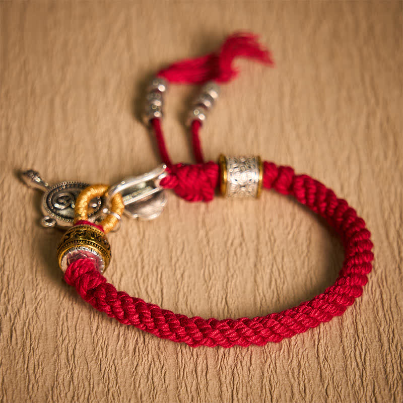 Fu Swastika Rope Bracelet - Traditional bracelet with silver Om symbol pendant, gold accent beads and red braided thread, ethnic spiritual jewelry