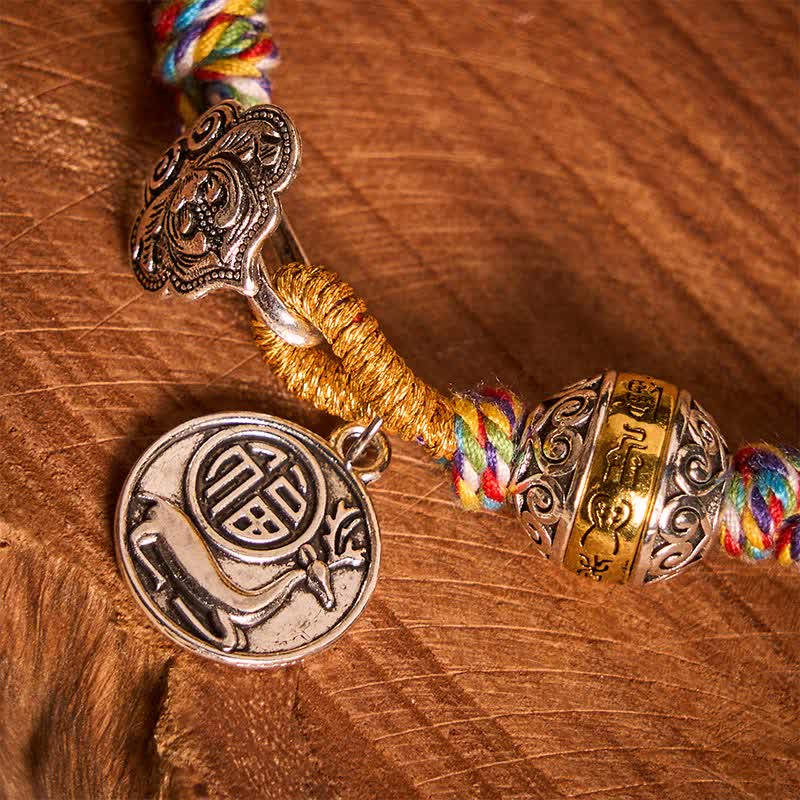 Fu Swastika Rope Bracelet - Green braided rope bracelet with Tibetan silver fortune charm and Buddhist prayer wheel, adjustable handmade jewelry