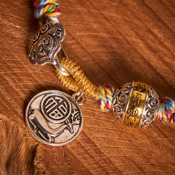 Fu Swastika Rope Bracelet - Green braided rope bracelet with Tibetan silver fortune charm and Buddhist prayer wheel, adjustable handmade jewelry