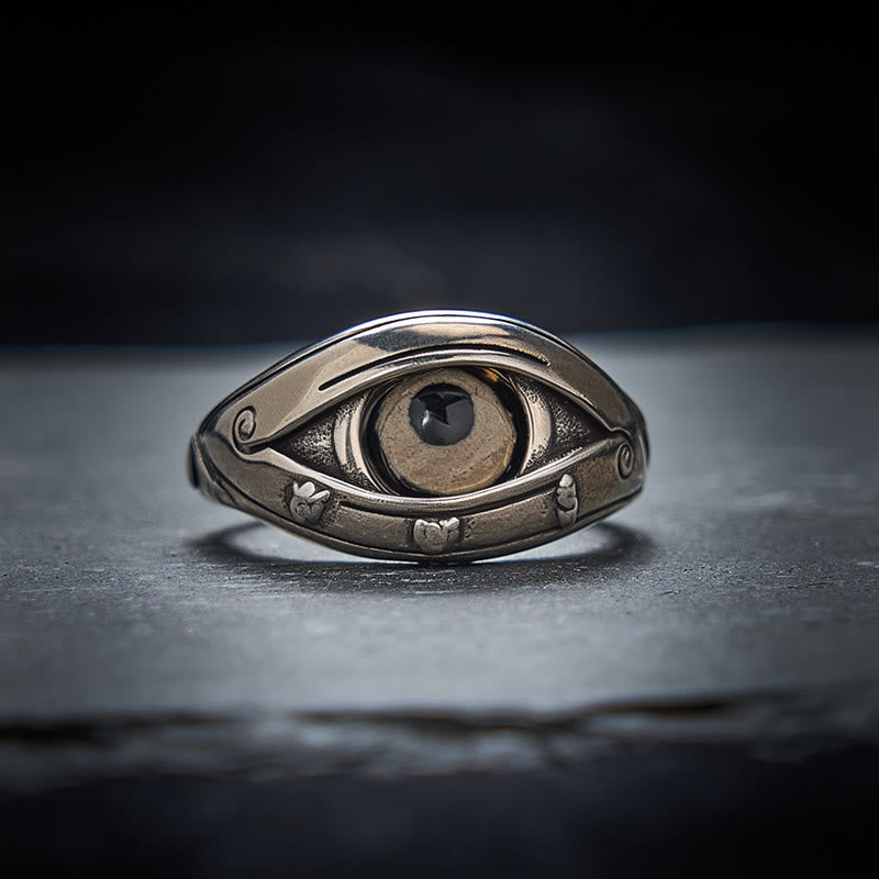 Dzi Evil Eye Ring – Copper ring with sculpted evil eye, dark pupil in tan agate stone, adjustable
