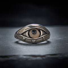 Dzi Evil Eye Ring – Copper ring with sculpted evil eye, dark pupil in tan agate stone, adjustable