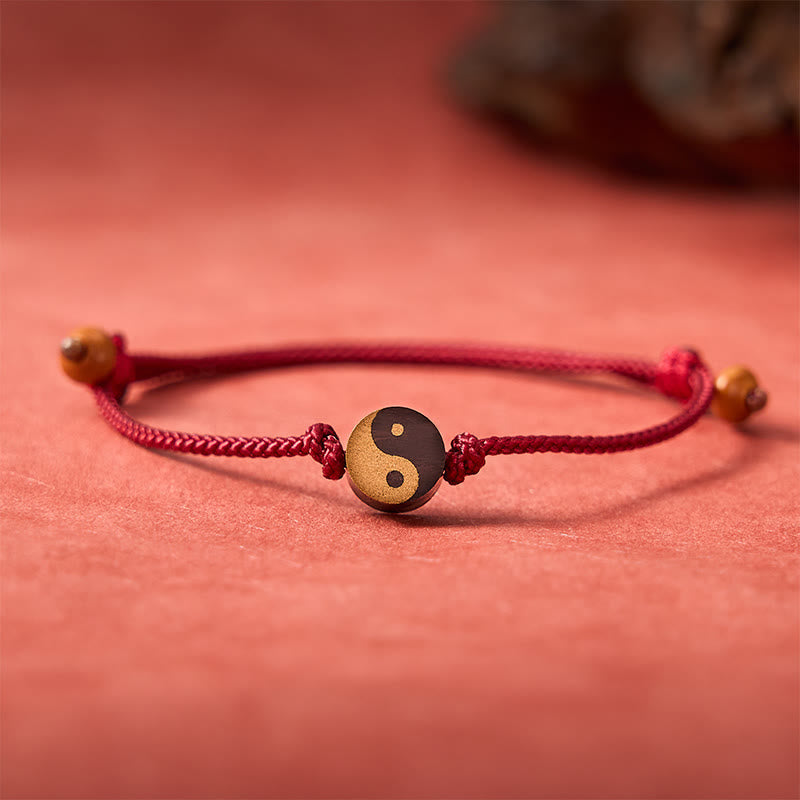 Ebony Yin Yang String Bracelet – gold black yin yang bead on braided red cord, taijitu jewelry