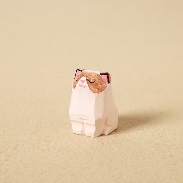 Wood Cat Keychain - Close-up of white colorpoint cat figurine with pink nose, hand-carved detail
