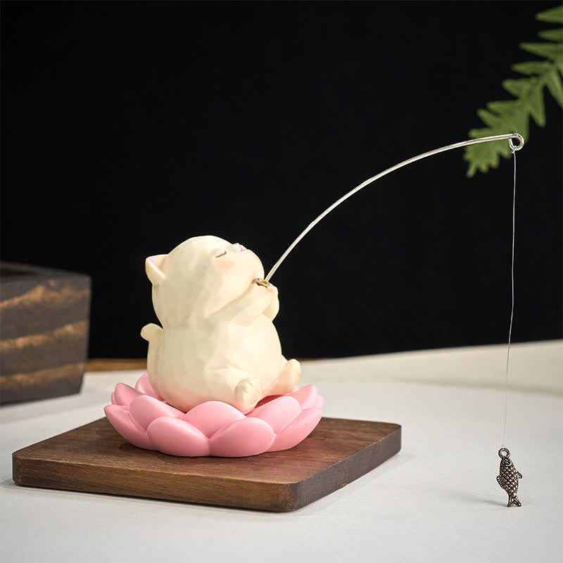 Lotus Animal Fishing Desk Decor - resin cat fishing statue on dark wooden base with silver rod, lotus zen ornament