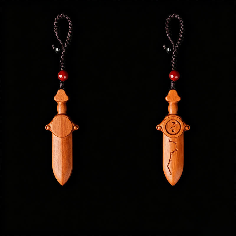 Yin Yang Sword Keychain - Carved wood sword amulet with yin-yang and Big Dipper constellation, front and back view, red bead 