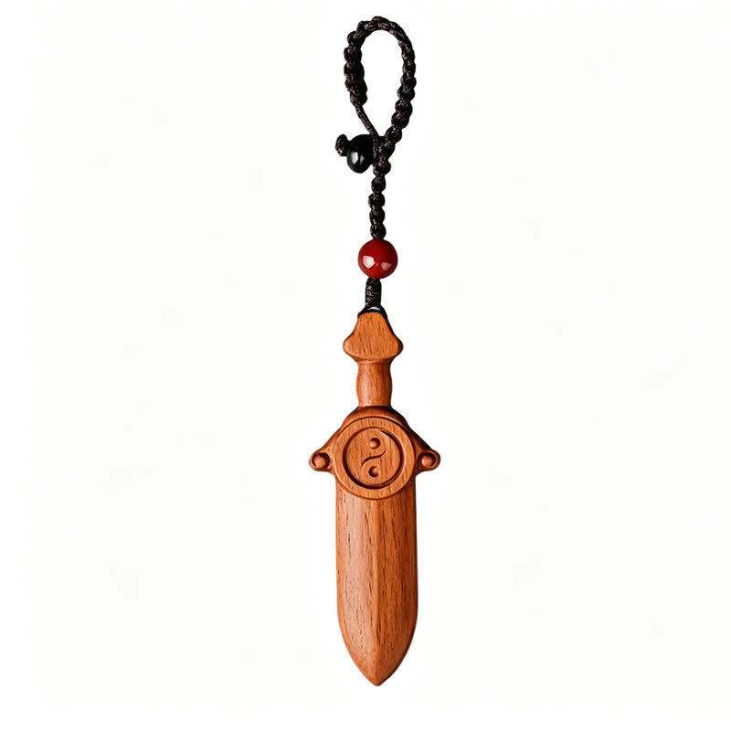 Yin Yang Sword Keychain - Traditional peach wood sword keychain with yin-yang symbol, red bead and black braided cord, white 
