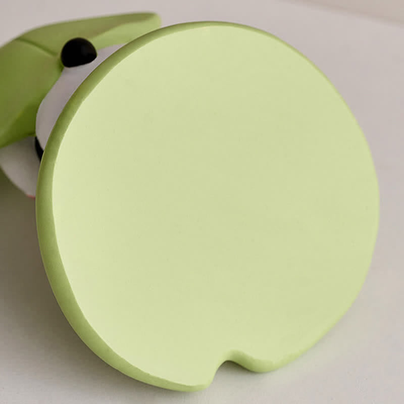 Resin Lotus Panda Phone Stand – Close-up portrait of panda face with green leaf hood, kawaii expression with pink blush, n...