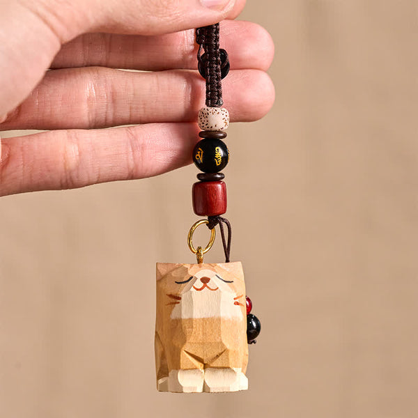 Wood Cat Keychain - Tan cat held in hand showing size, with mantra bead and Bodhi seed, handmade
