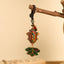 Rainbow Eucalyptus Koi Fish Keychain – multicolor koi fish pendant on wooden branch with braided cord, cream background