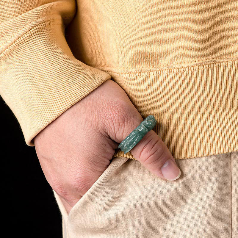 Natural Jade Dragon Ring - Carved jade thumb ring worn with casual outfit, Confidence