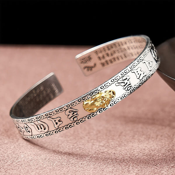 PiXiu Dragon Lotus Silver Bracelet – Silver cuff with gold PiXiu and Heart Sutra engraving, wealth luck
