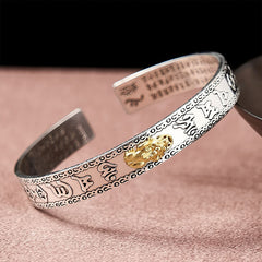 PiXiu Dragon Lotus Silver Bracelet – Silver cuff with gold PiXiu and Heart Sutra engraving, wealth luck