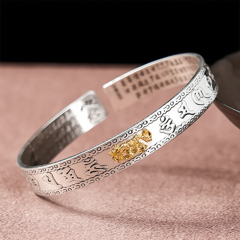 PiXiu Dragon Lotus Silver Bracelet – Silver cuff with gold dragon charm side view, Heart Sutra engraving, luck Imagen principal del producto