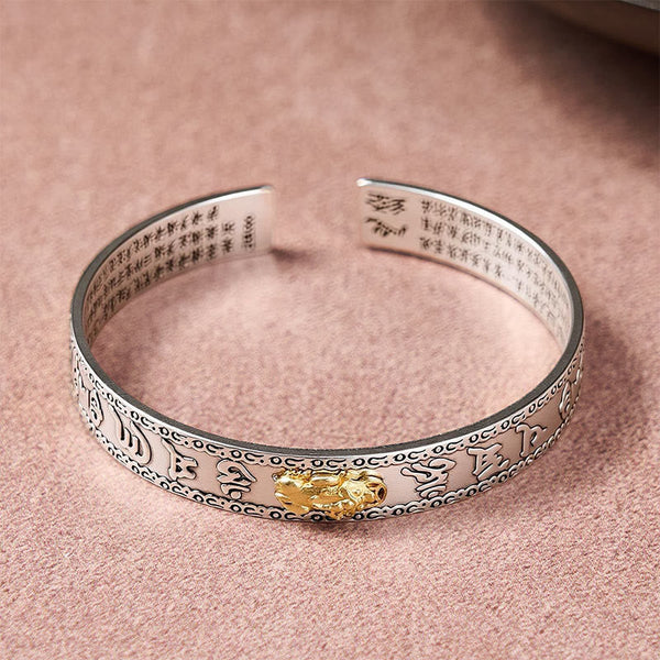 PiXiu Dragon Lotus Silver Bracelet – Top view silver cuff with engraved open ends, feng shui bracelet