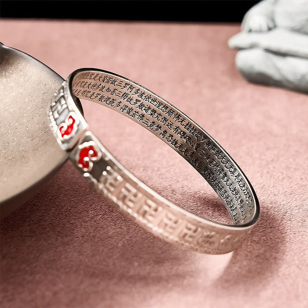 PiXiu Dragon Lotus Silver Bracelet – Close-up gold dragon charm on silver cuff bracelet, good luck