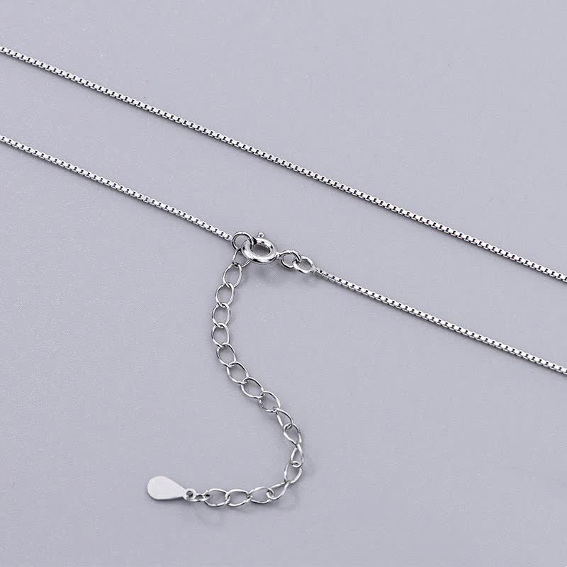 Zen Cairn Crystal Pendant – silver box chain with lobster clasp on gray background, adjustable necklace