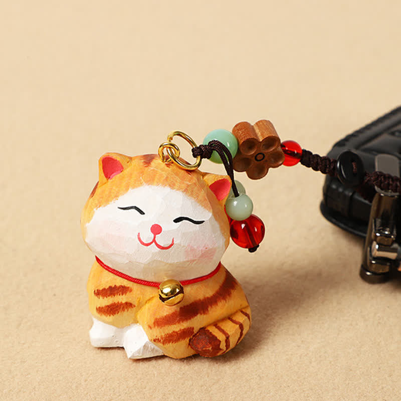 Carved Wood Cat Keychain - Orange tabby cat with jade beads and flower, keychain accessory Imagen principal del producto