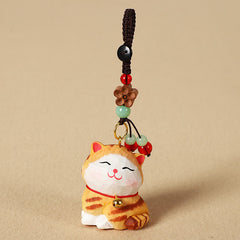 Carved Wood Cat Keychain - Orange tabby cat with jade beads and wooden flower, charm