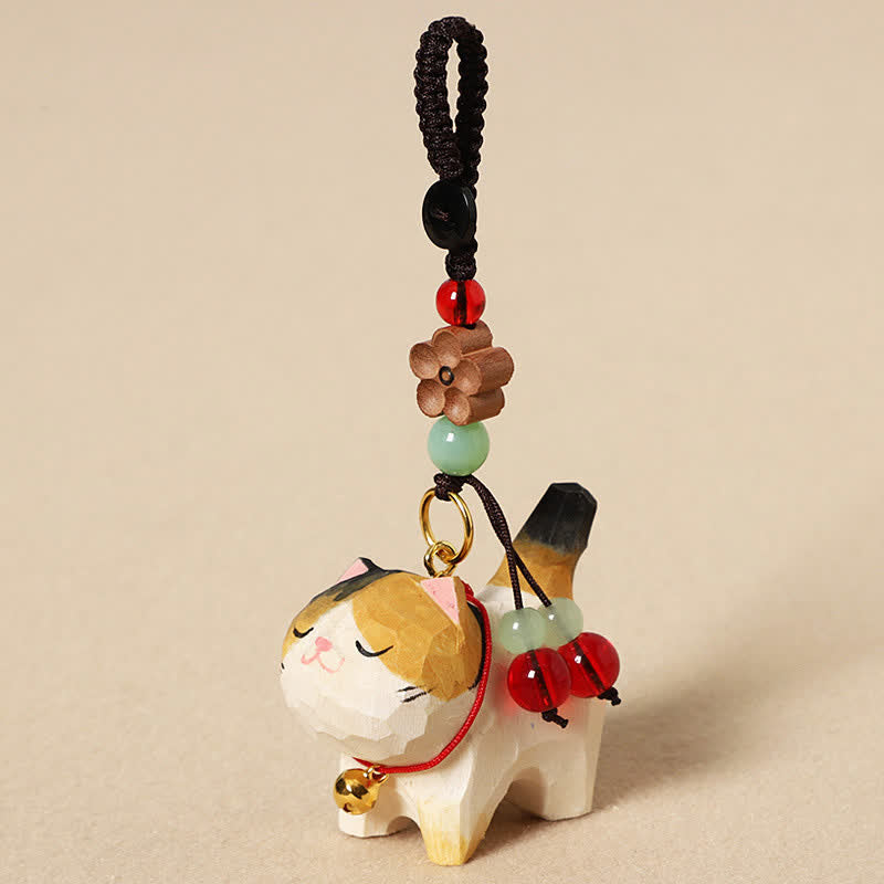 Carved Wood Cat Keychain - Calico cat with orange patches, wooden flower bead, jade bead, gold bell charm