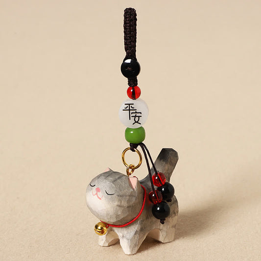 Carved Wood Cat Keychain - Tan cat with peace bead, gold bell collar, green and red tassel, lucky cat charm