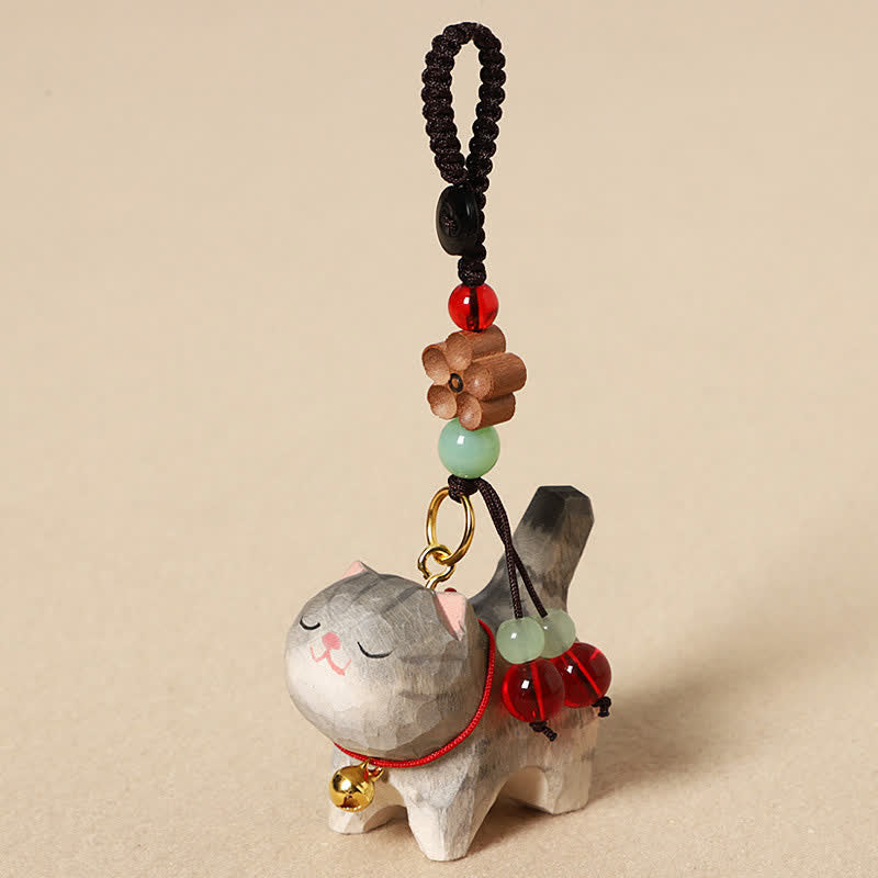 Carved Wood Cat Keychain - Gray tabby cat with red bell, red and green beads, wooden flower charm, wooden keychain Main image