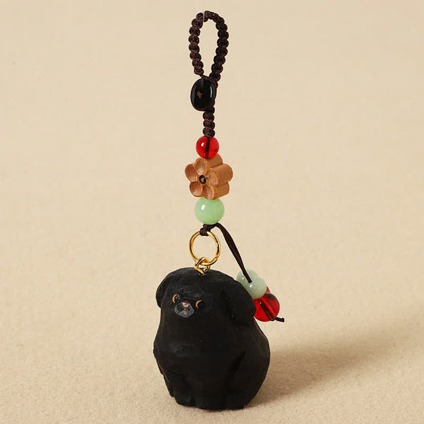 Wood Dog Keychain – Black pug with peace blessing bead and green jade accent, carved wooden pendant