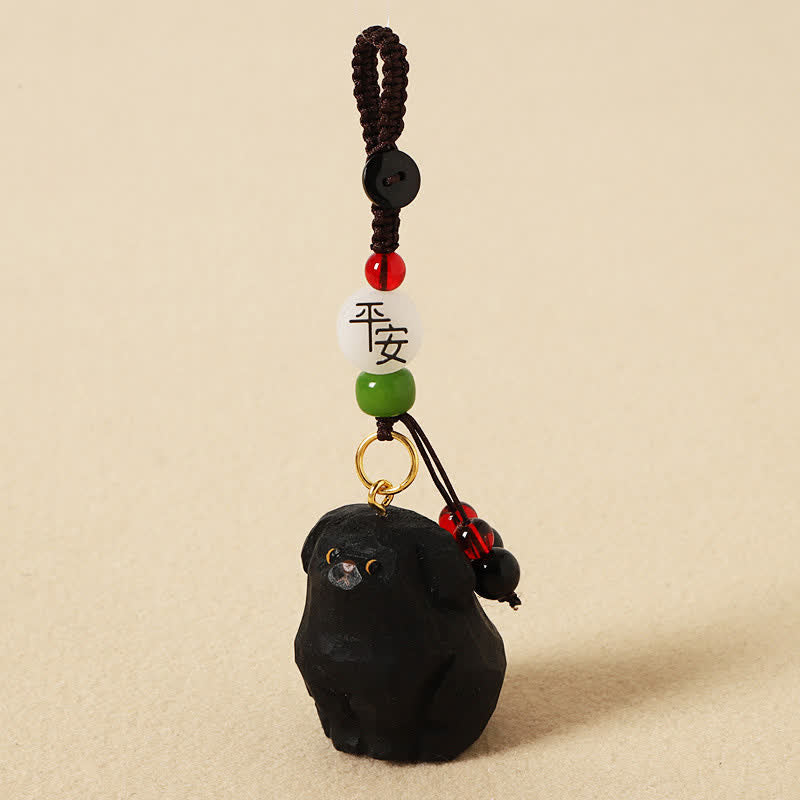 Wood Dog Keychain – Black carved dog with Bodhi seed and Sanskrit mantra bead, spiritual wood charm