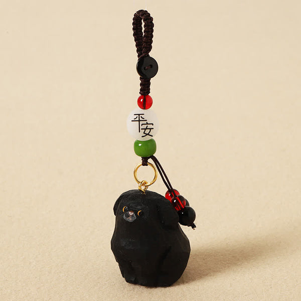 Wood Dog Keychain – Black carved dog with Bodhi seed and Sanskrit mantra bead, spiritual wood charm