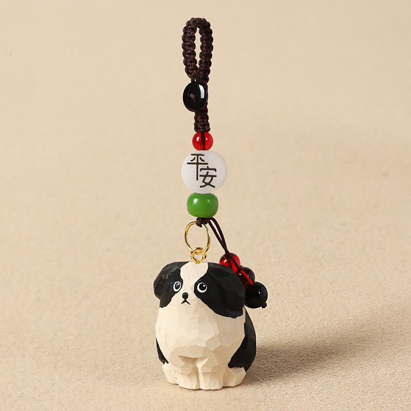 Wood Dog Keychain – Black and white dog figure with peace blessing bead and jade accents, carved wood charm