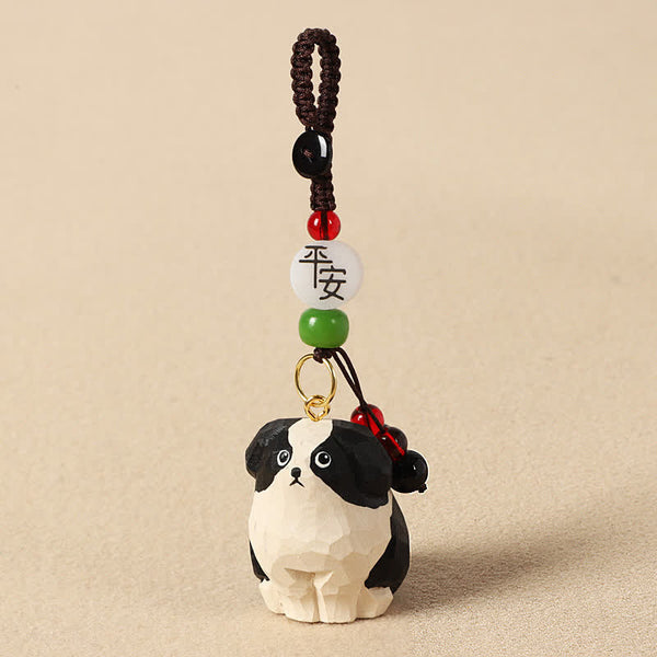 Wood Dog Keychain – Black and white dog figure with peace blessing bead and jade accents, carved wood charm