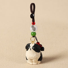 Wood Dog Keychain – Black and white dog figure with peace blessing bead and jade accents, carved wood charm