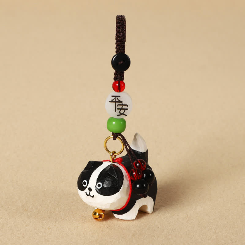 Carved Wood Dog Keychain - Black and white dog with peace blessing bead, talisman