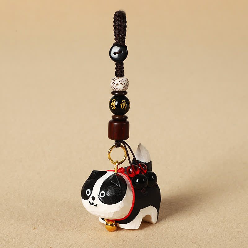 Carved Wood Dog Keychain - Black and white dog with lotus seed and calligraphy bead