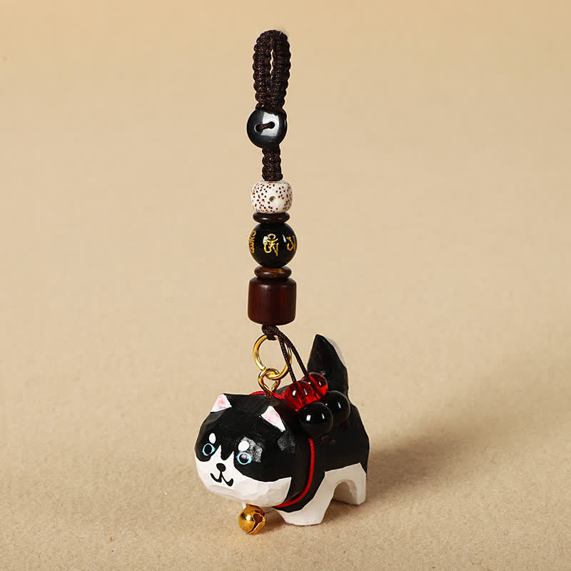 Carved Wood Dog Keychain - Black and white Husky with mantra bead, spiritual charm