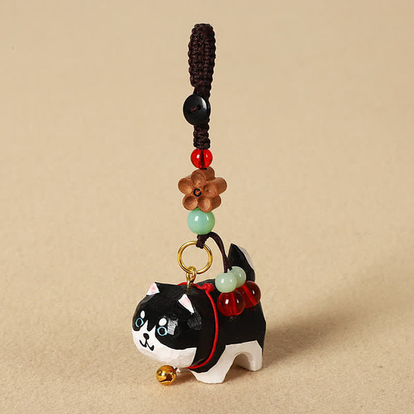Carved Wood Dog Keychain - Black and white dog with jade beads and flower, keyring