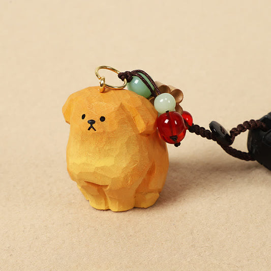 Carved Wood Dog Keychain – golden carved dog with red and green beaded accents, handmade keychain
