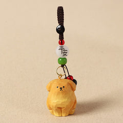 Carved Wood Dog Keychain – faceted wood dog with peace character bead and red green accents, luck charm