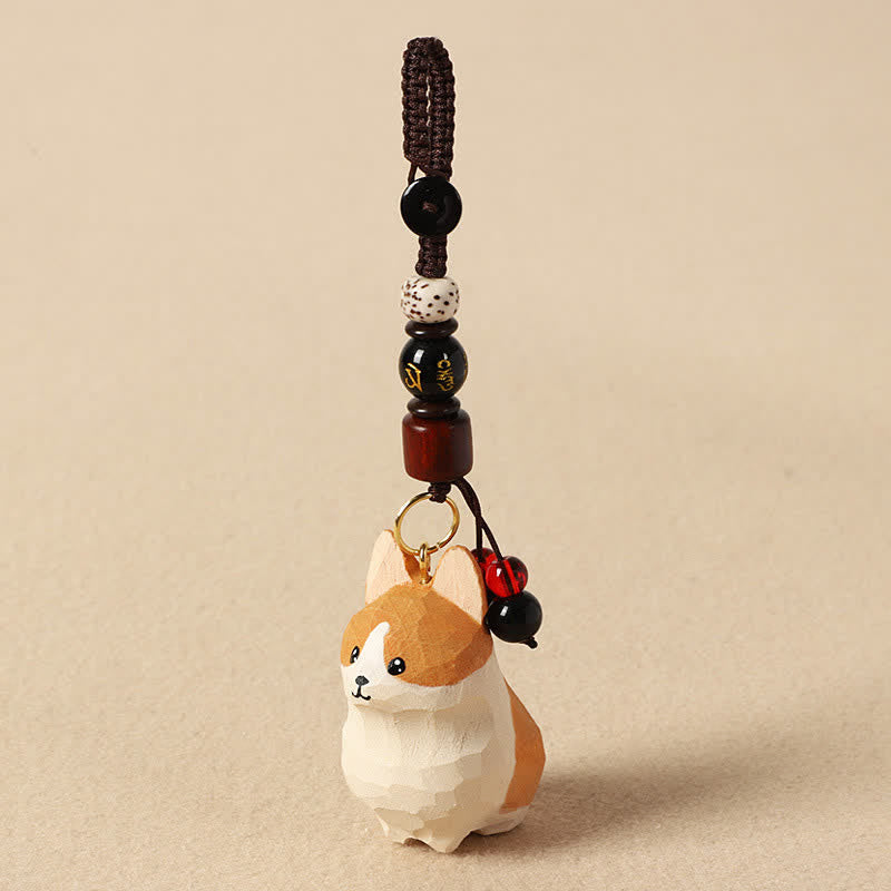 Carved Wood Corgi Om Mani Padme Hum Key… – Dog keychain with gold character bead, speckled stone bead, and red dangle, handc…