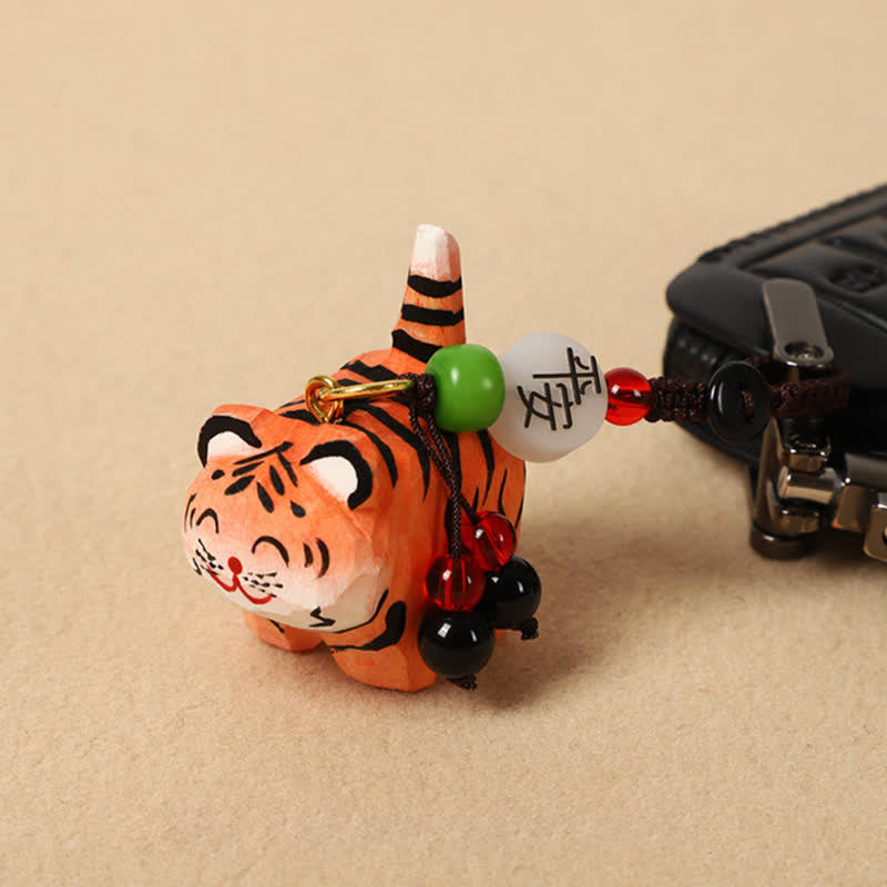 Wood Tiger Keychain – orange tiger attached to key fob with beaded cord, Buddhist charm