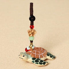 Wood Turtle Keychain – Carved turtle with beaded cord, red glass, wooden flower charm, jade bead, boho charm